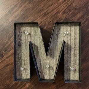 Light up letter ‘M’